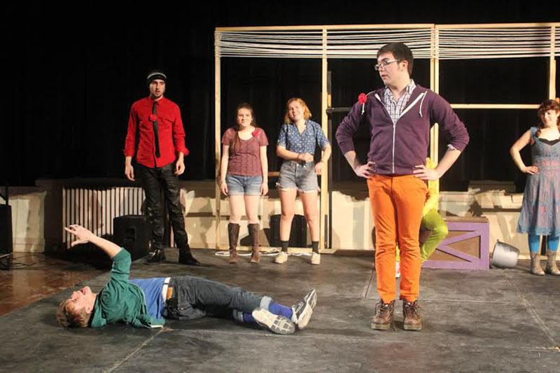 From left, College junior Mike Sederquist as a Disciple, Conservatory first-year Billy Krager as John the Baptist, College first-year Jenny Kneebone, and College sophomores Ariana Silvan-Grau, Colin Anderson and Elizabeth Gobbo as Disciples leave it all on the stage during Godspell. The musical retold the story of Jesus with plenty of modern-day twists and turns. 