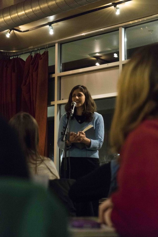 College senior Sarah Chatta performs at Slow Train
for Love in Many Tongues, a multilingual poetry
reading organized each year by the Oberlin Center
for Languages and Cultures to celebrate Valentine’s
Day.