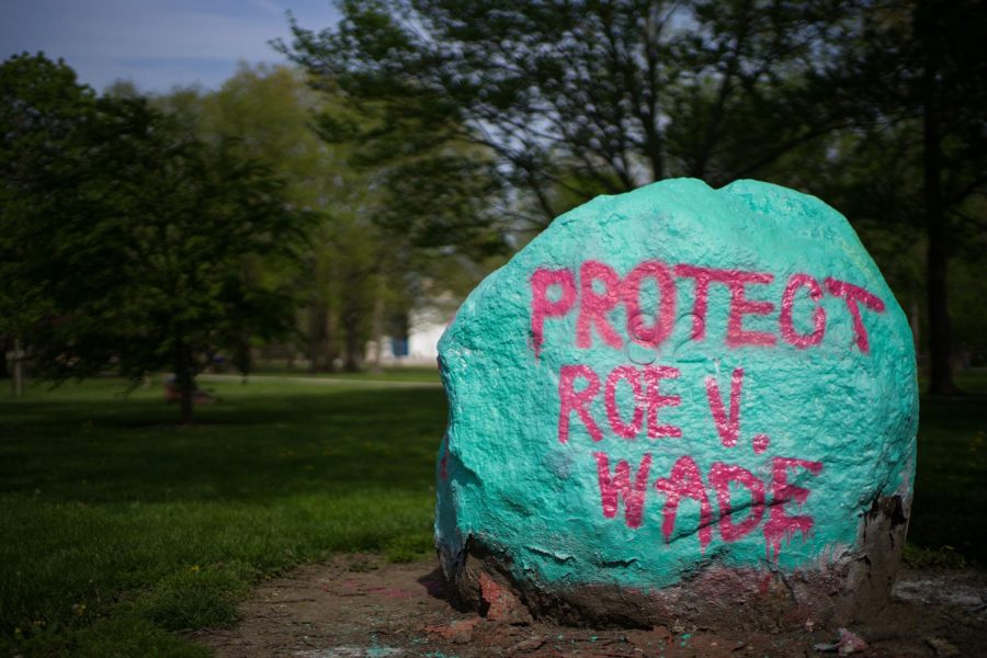 Students painted a rock in Tappan Square with the slogan “Protect Roe v. Wade” after the Supreme Court leak.