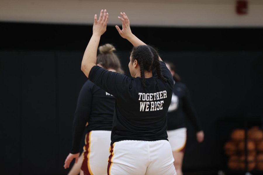 “Together We Rise” jersey signify DEI work within the athletic department. 