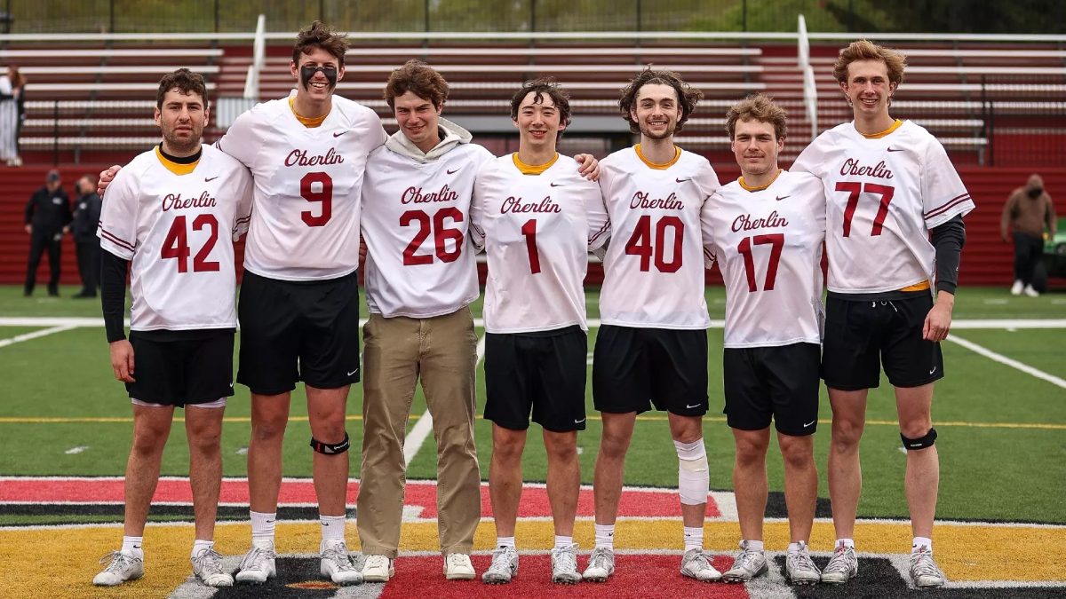 Men’s lacrosse seven seniors pose before their Senior Day game against Depauw University.